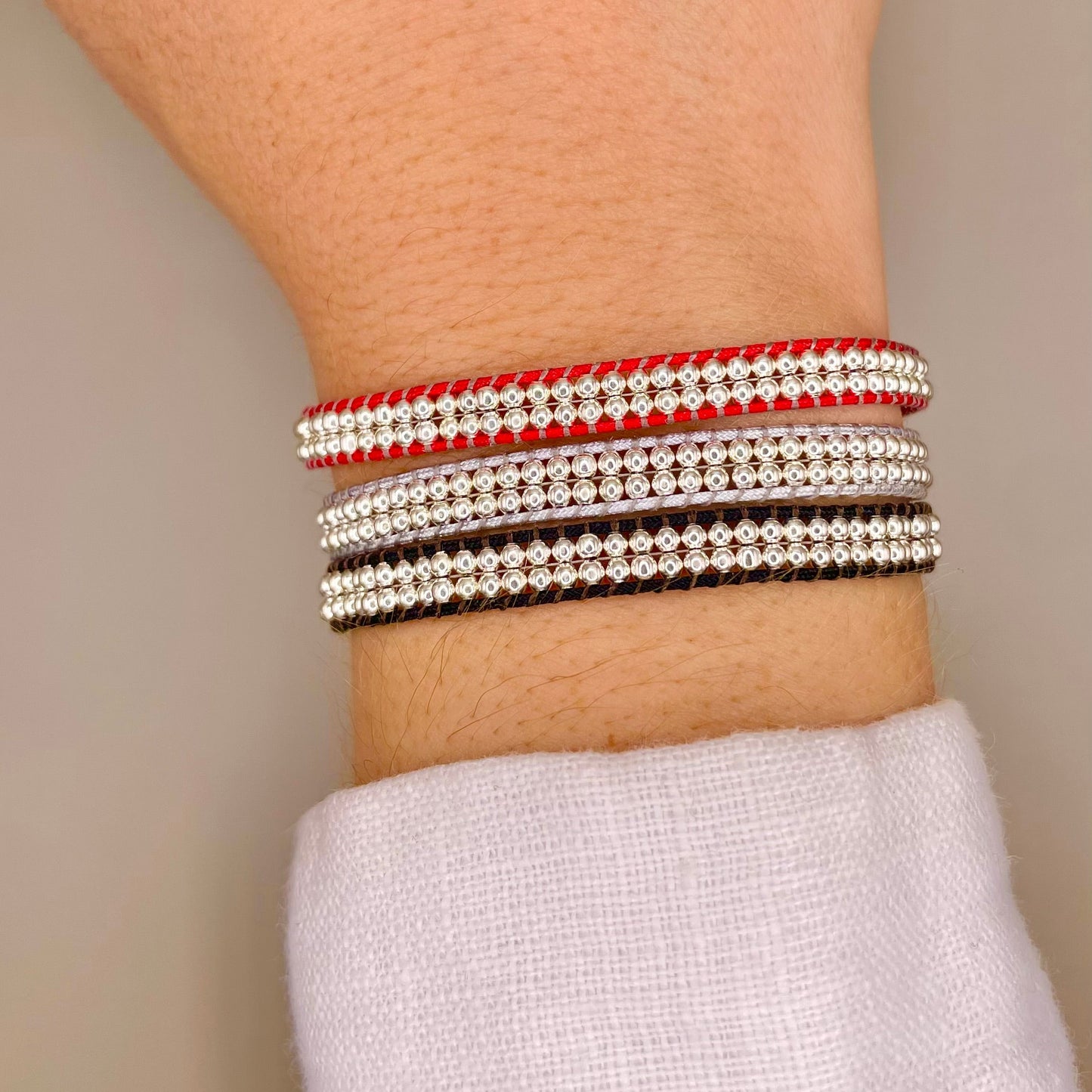 Brazalete tejido y ajustable Plata
