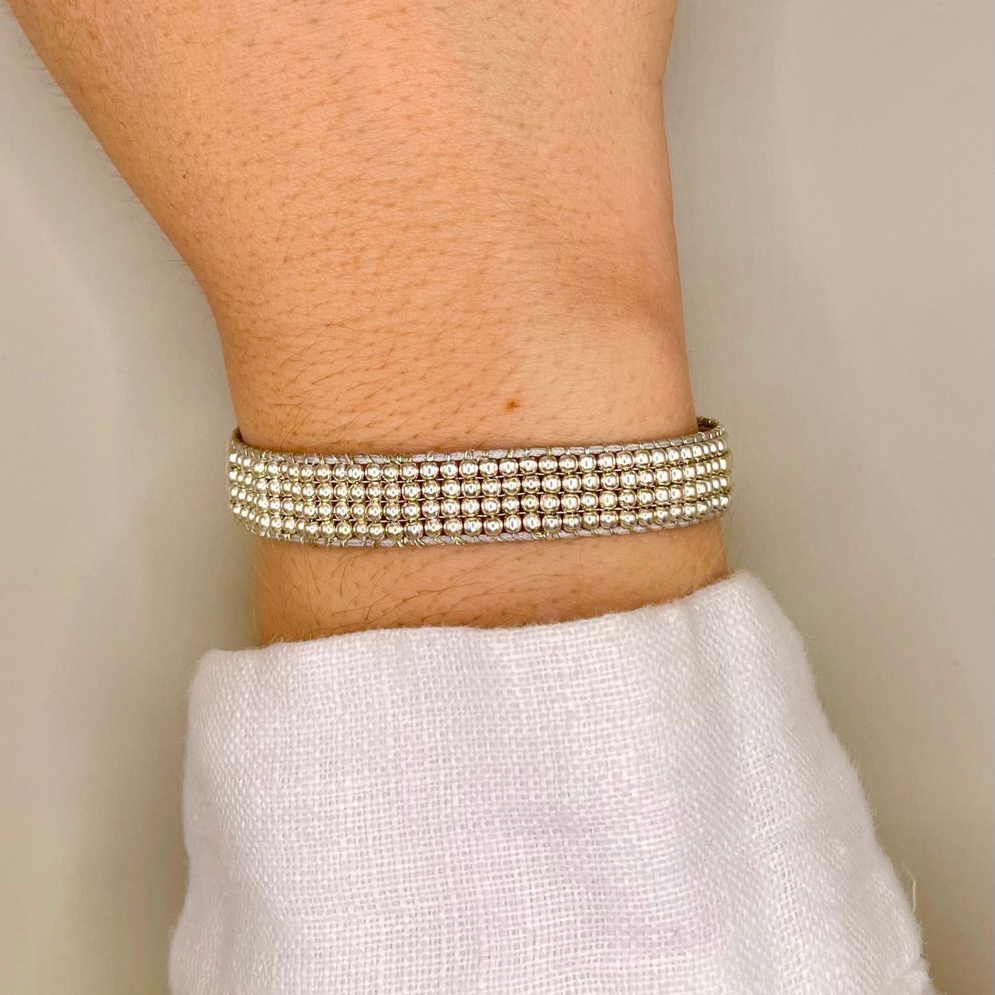 Brazalete tejido ajustable plata