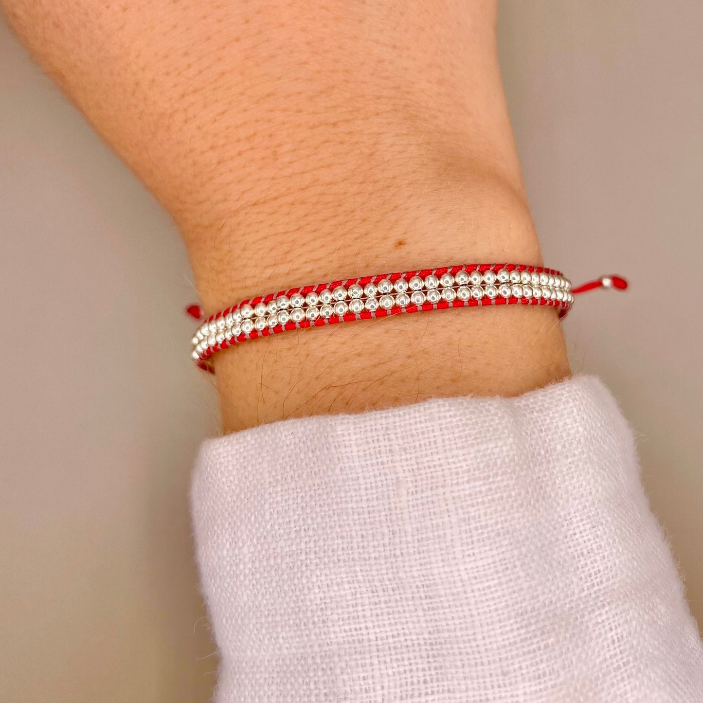Brazalete tejido y ajustable Plata